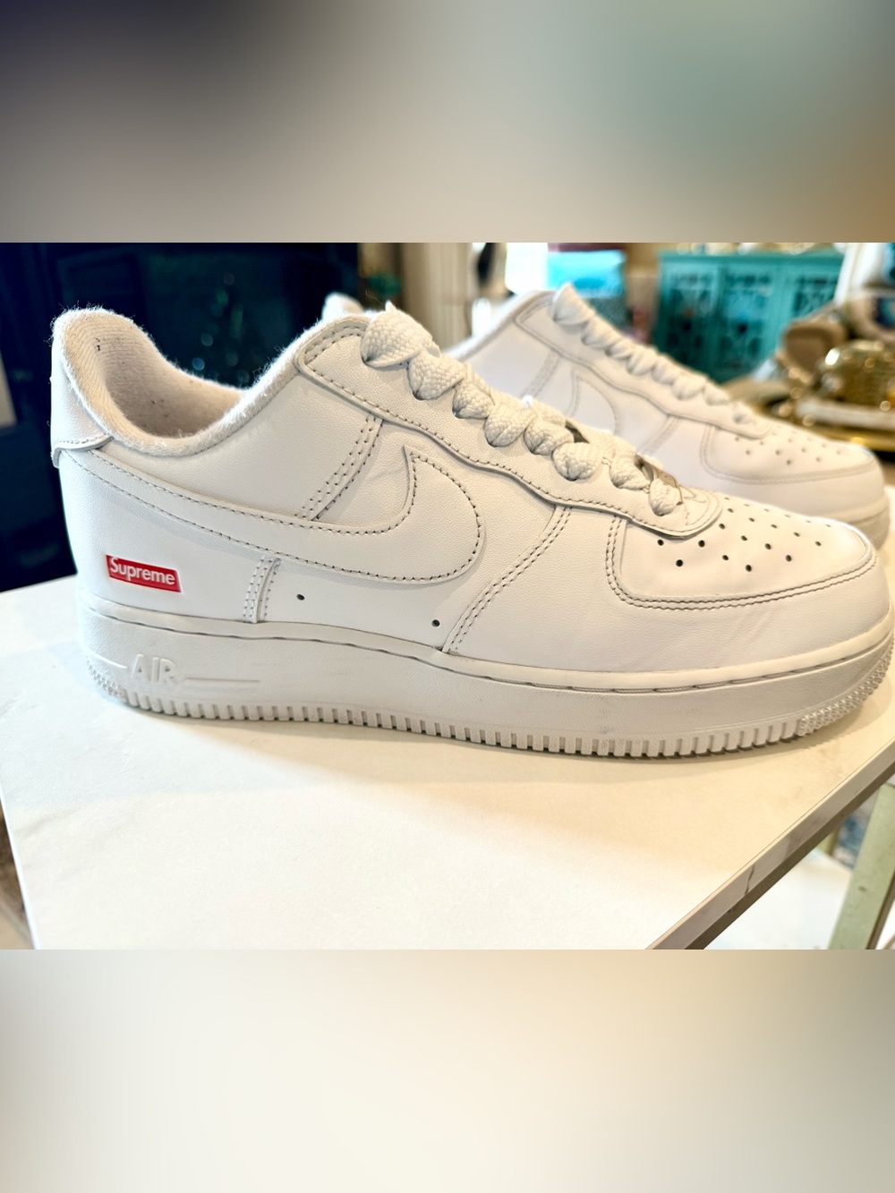 Nike White Leather Low-Top Sneakers with Red Supreme Logo